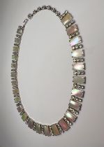 A mid 20th century cocktail necklace formed from rectangular pieces of mother of pearl, each
