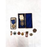 A hallmarked silver Masonic medal in case (case a.f) a variety of non military badges etc