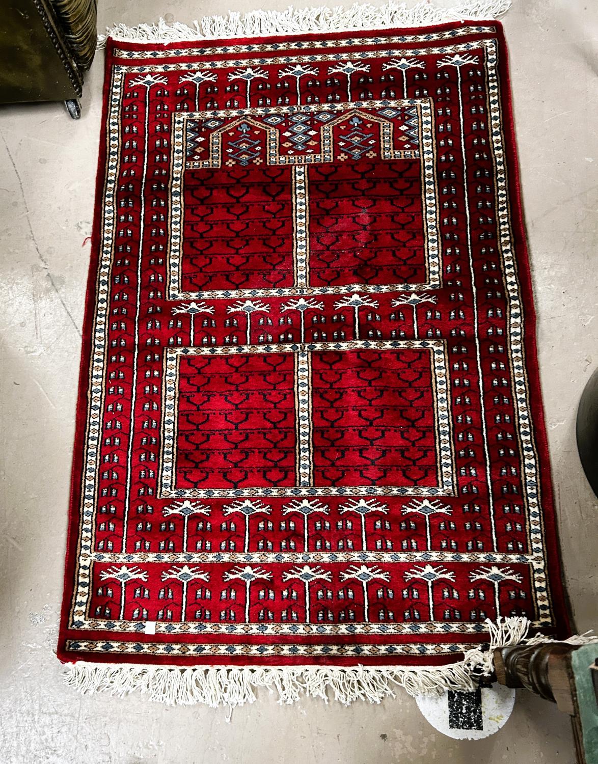 A modern red ground hand knotted Persian rug, length 200cm