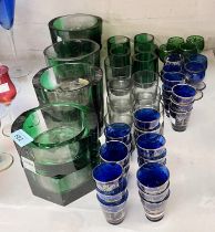 Eight clear and green glass bowls of shaped oval form, 2 side ribbed, labels Pauly & C; 5 smaller