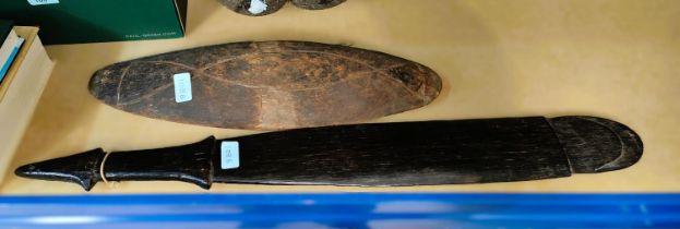 An early 20th century hard/ironwood Oceania war club/paddle, basic carved handle grip and tip,