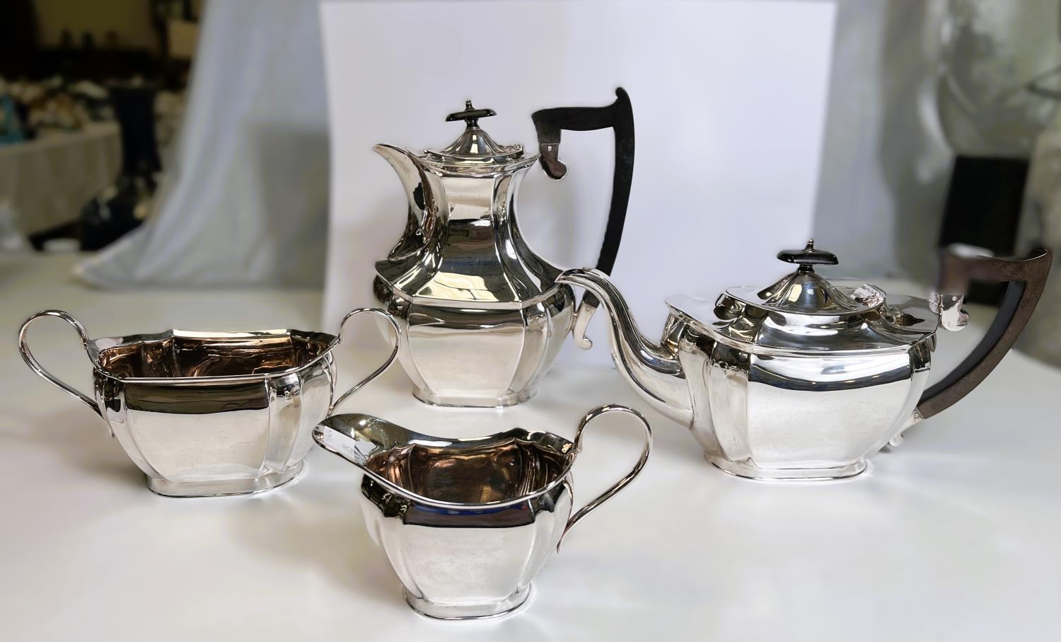 A hallmarked silver 4 piece tea service of oval baluster ribbed form, Sheffield 1921, 59.5oz