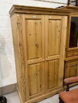 A modern pine double door wardrobe