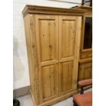 A modern pine double door wardrobe