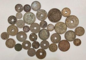 A selection of GB and foreign coins, many with silver content