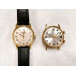 A SEKONDA gents wristwatch with cream dial and gilt Arabic numbers and hands on a leather strap; a