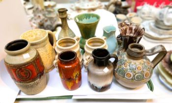 A selection of 1930's and later vases:  lava ware; decorative plates; a silver plated hot water jug;