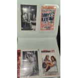 An album of 128 approx. postcards:  Marilyn Monroe; Charlie Chaplin; Laurel & Hardy; etc.; another