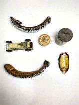 A pair of military epaulettes; a BSA badge; a Trench Art coin holder; 2 'Radiolyte' crystals; a