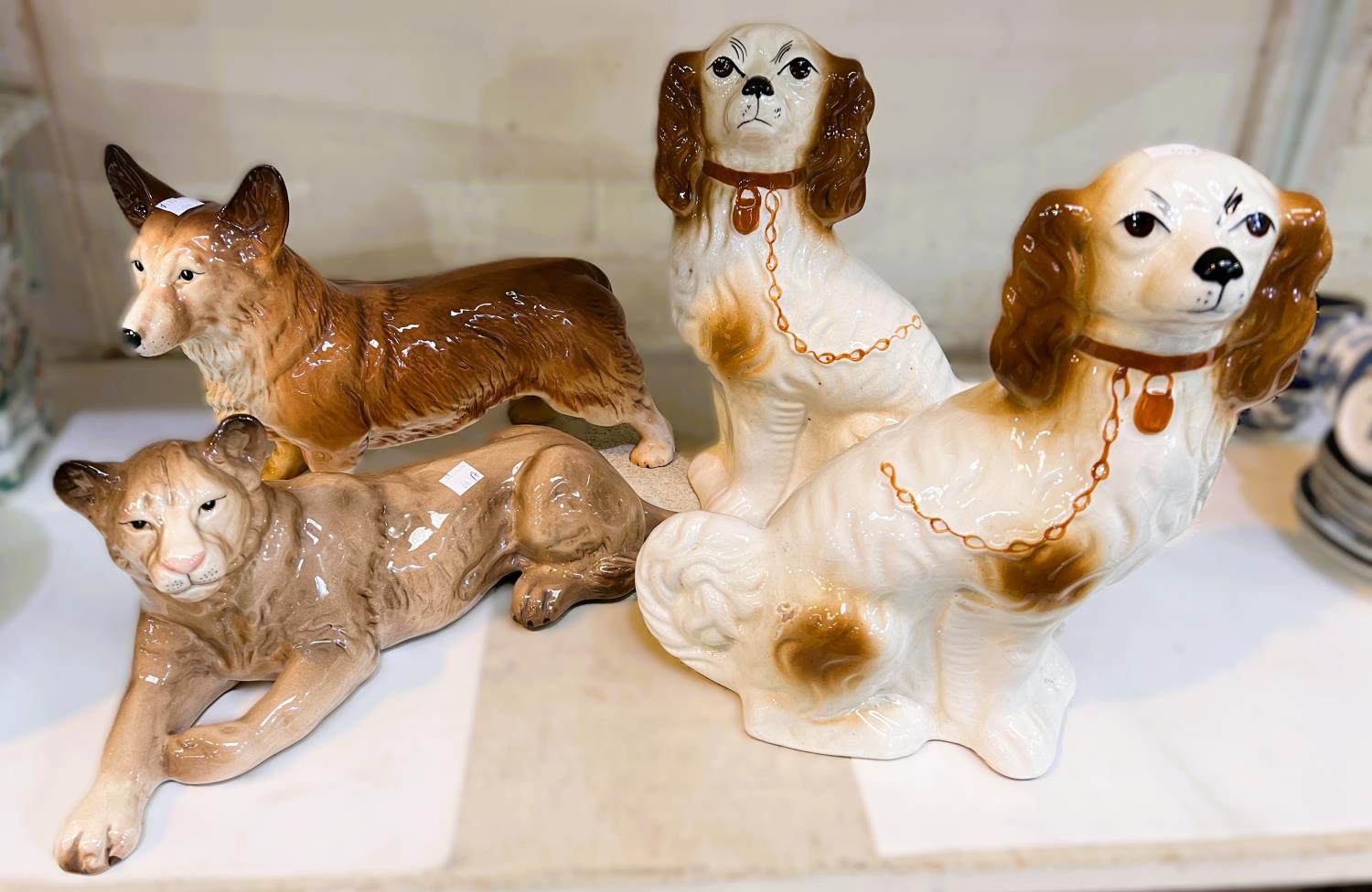 A pair of Staffordshire style King Charles Spaniels; a large Melba Corgi Dog and a large Melba