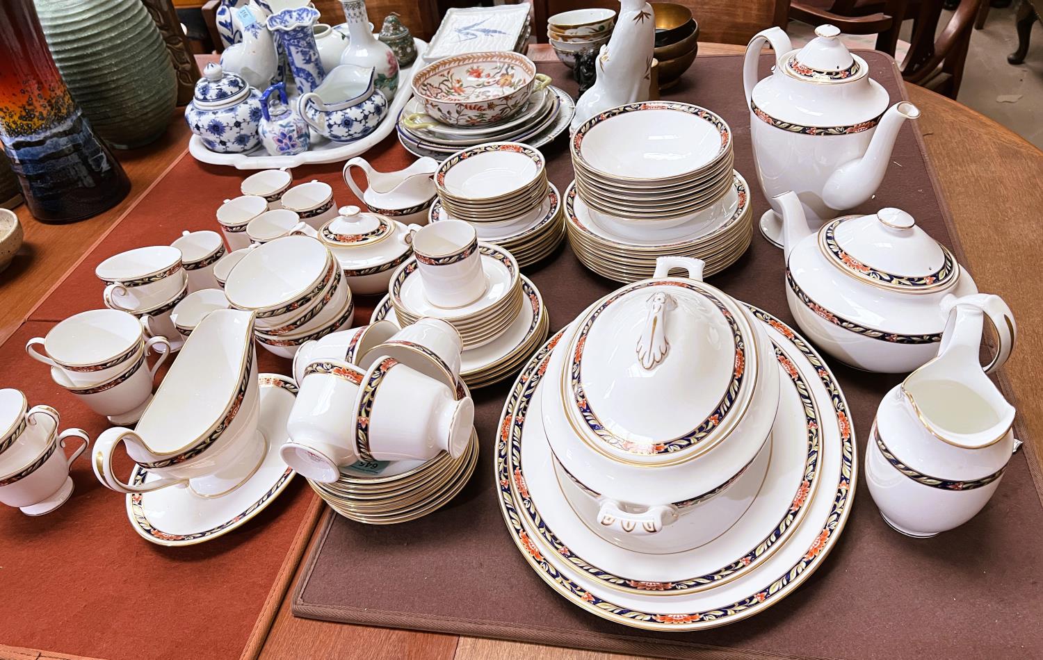 A comprehensive Spode 'Orient' Y8520 dinner, tea and coffee service, white with border of gilt,