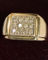 A 9ct gold dress ring set with square of small diamond chips, stamped 375 .5 to interior, 8.4gms