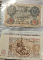 A collection of world banknotes in album including examples from the Soviet Union etc