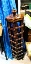 An Edwardian wooden rotating postcard display rack, six sided, ht. 104cm