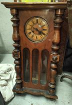 A collection of clocks and clock parts including granddaughter clock movement, hood and case