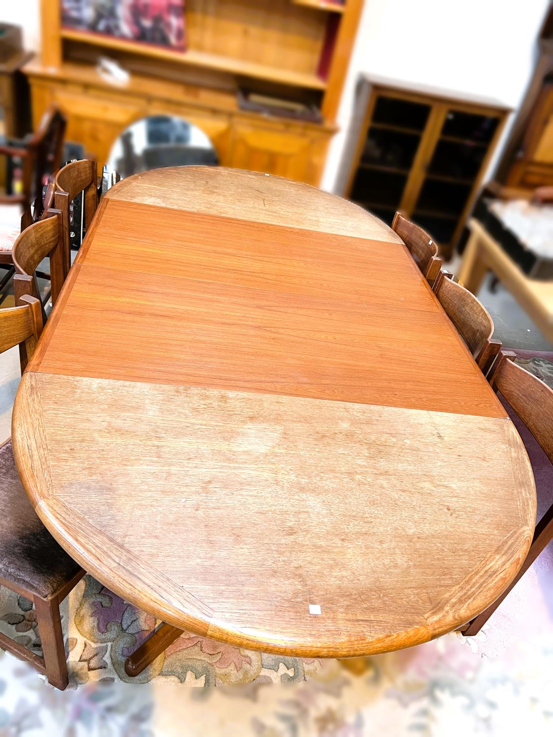 A large 1970's G-Plan oval teak extending dining table, 2 spare leaves, extended length 234cm - Image 3 of 4