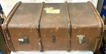 An early 20th century wood bound cabin trunk