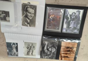 Two albums of vintage film related postcards:  John Wayne; etc., 240 approx.