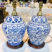 A modern pair of Chinese style table lamps in blue and white