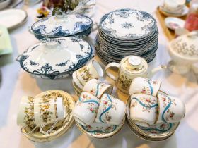 A Victorian "Cambridge" part dinner service in blue & white with 2 covered tureens, 24 pieces