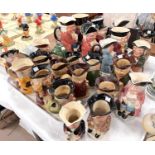 A large collection of Wood Staffordshire and other Toby jugs approx. 28