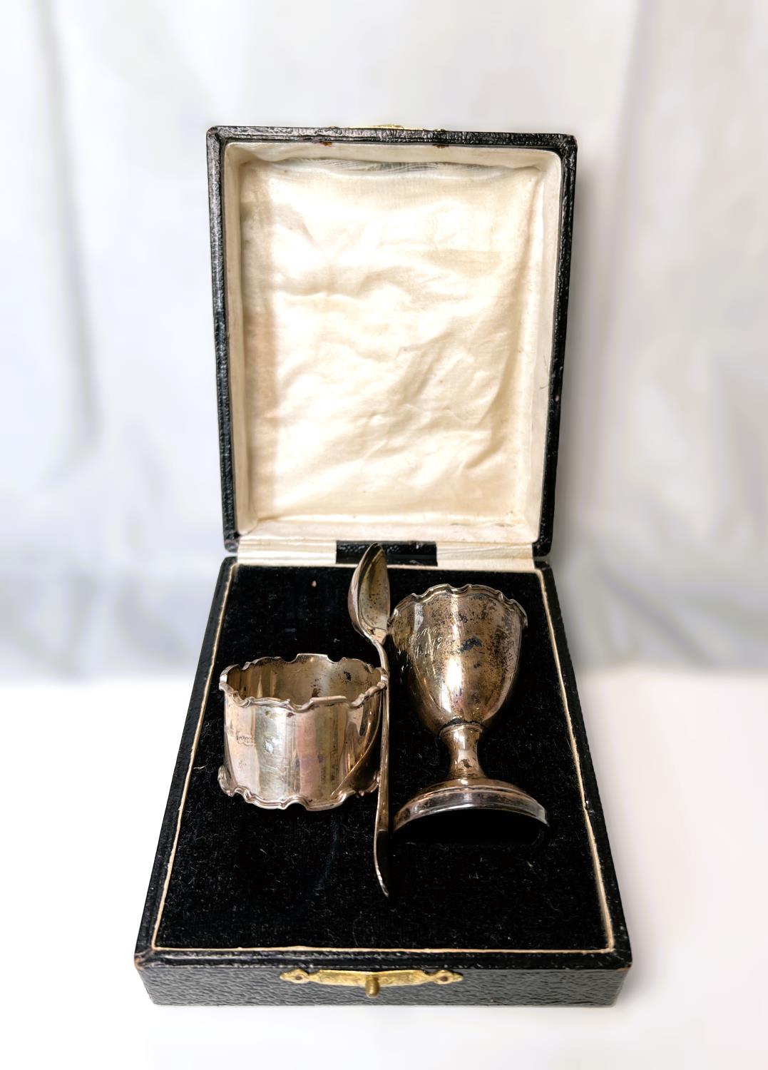 A hallmarked silver originally boxed 3 piece christening set comprising egg cup, teaspoon and napkin - Image 2 of 6