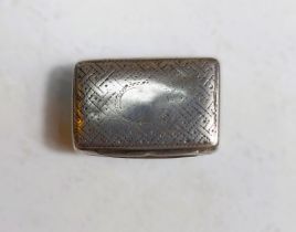 A small hallmarked silver vinaigrette by Thomas Shaw, the decoration and cartouche are worn, no lid,