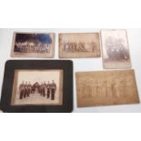 A rare early photograph of a Rifle Corps, 12 x 22cm, 4 other group photos
