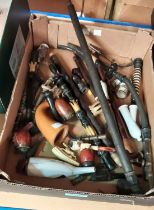 A collection of ceramic and other pipe parts, novelty revolver etc, German etc