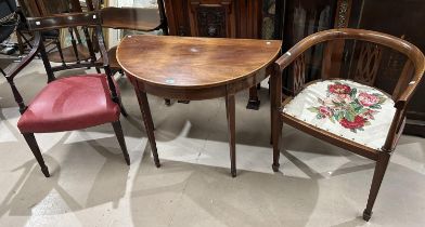 A Sheraton period mahogany carver chair with satinwood crossbanding, red leather upholstery, on