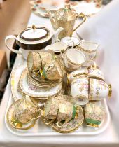 An Art Deco 15 piece coffee set in gilt and green 'Tuscan Plant'; a Windsor gilt/floral part tea