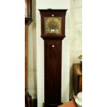 A mahogany cased, brass dial, granddaughter clock with chiming movement.