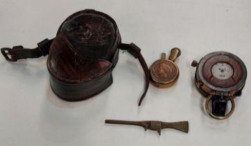 A French trench art lighter; a military compass with leather case