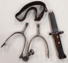 A British Army bayonet with shortened blade, 23cm overall and a pair of steel spurs, a leather strap