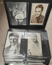 An album of postcards:  Beatles; entertainment; cricket; football; etc.; another album