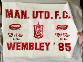 A MUFC vinyl poster Follow United to Wembley '85 (some damage to bottom edge)