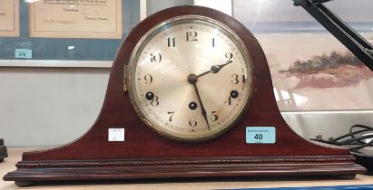 A mahogany cased chiming Napoleon hat mantle clock