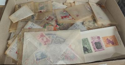 A collection of stamps in packets