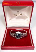 Omega: a Ladies Geneve Dynamic wristwatch oval case stainless steel bracelet and a blue dial with