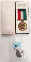 A QEII Silver Jubilee medal and another medal