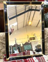 A wall mirror in black & gilt reeded frame; a mirror in shaped period style gilt frame