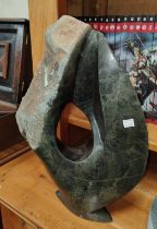 Andamiyo S. Chihota: African  carved stone sculpture of a bird with areas of smooth and naturalistic