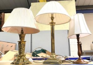 A 19th century brass table lamp with ornate square column; a modern brass table lamp; a turned