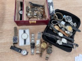A selection of watches in jewellery box.