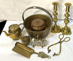 A brass jam pan and metalware