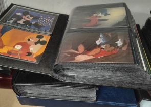 Four albums containing 500+ Disney related postcards:  Mickey Mouse; etc.