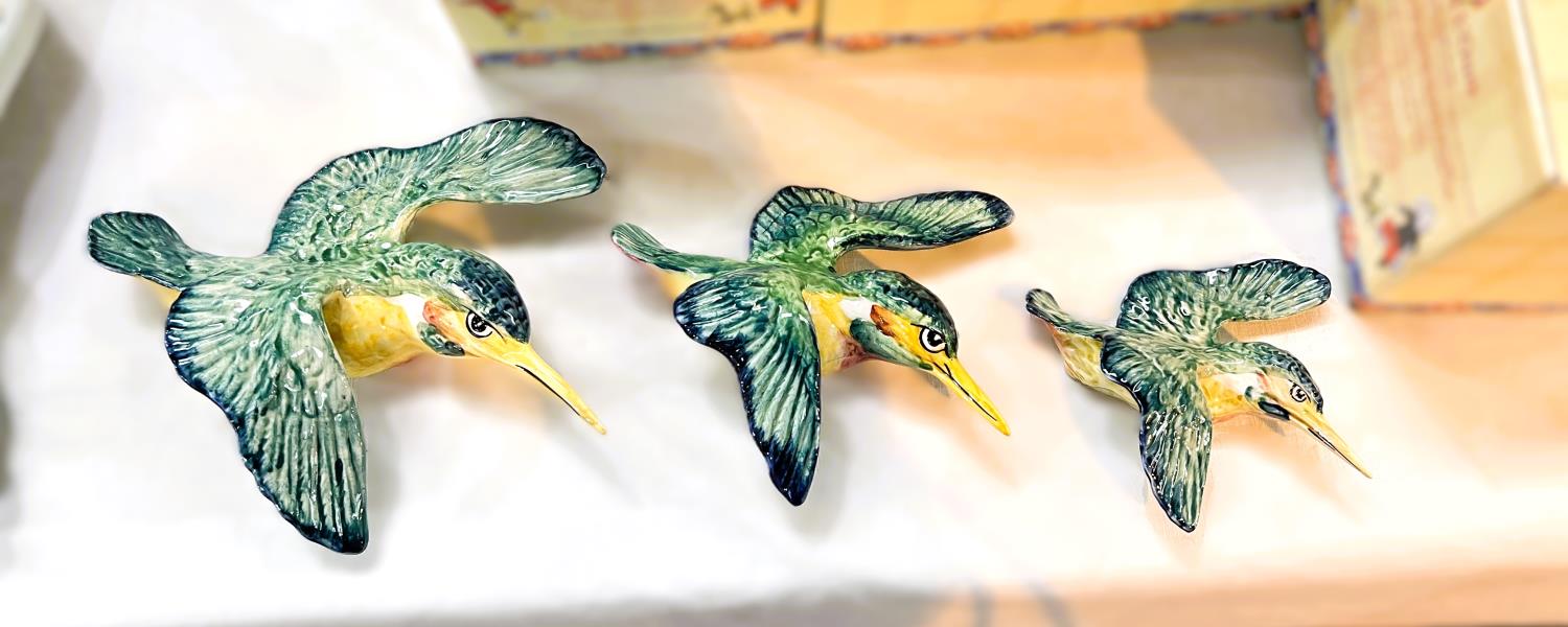 Three Beswick flying Kingfishers