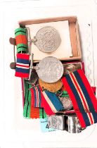 A collection of WWII medals and miniatures etc.