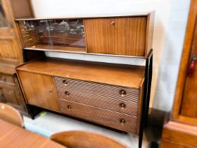 A 1950's / 60's sideboard with raised display / cocktail cabinet to the back, 3 drawers and cupboard