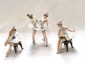 A Lladro group:  2 dancing ballerinas, impressed 5497, height 18cm; 2 seated ballerinas (minor chips